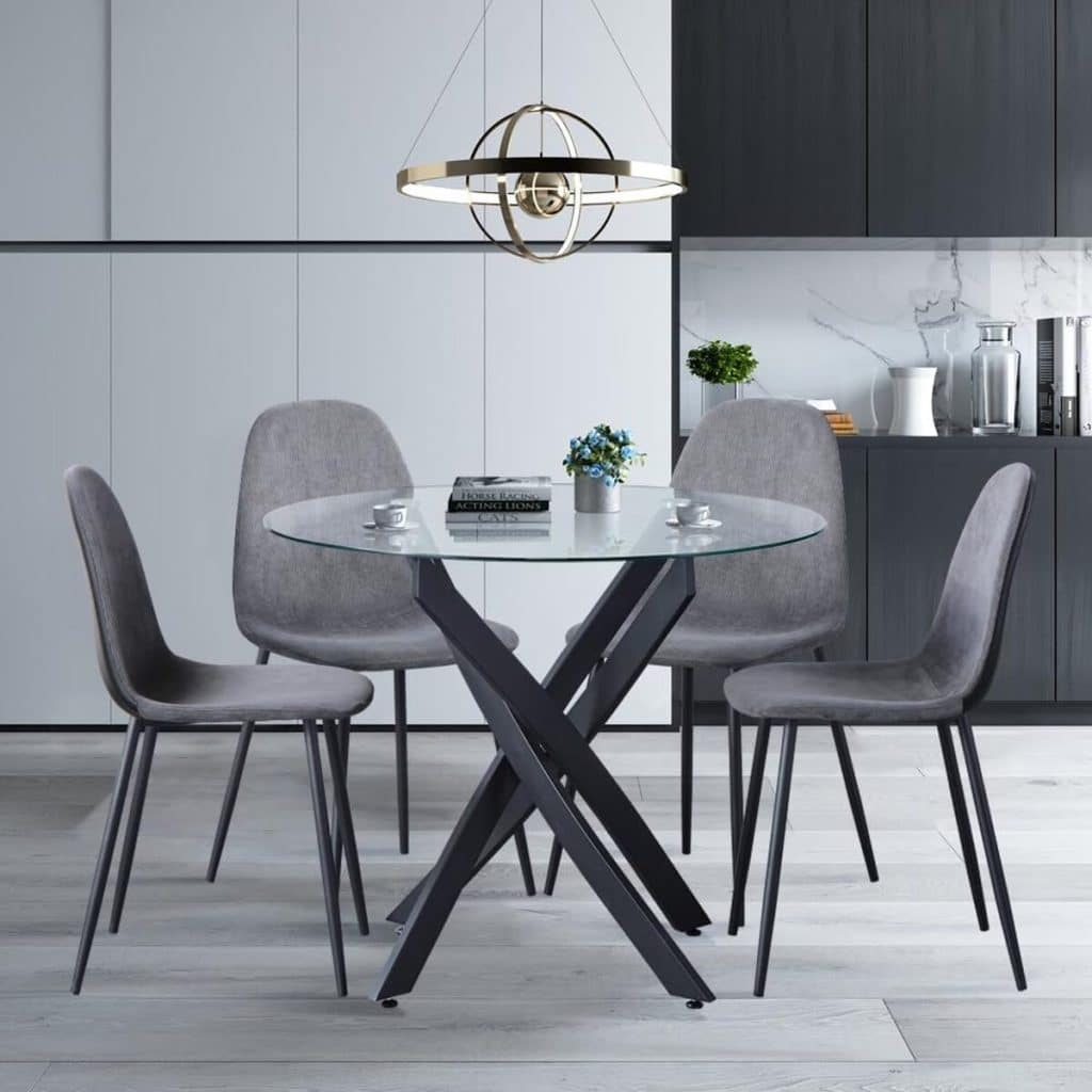 Avis sur la table ronde Goldfan avec 4 chaises grises : élégance moderne